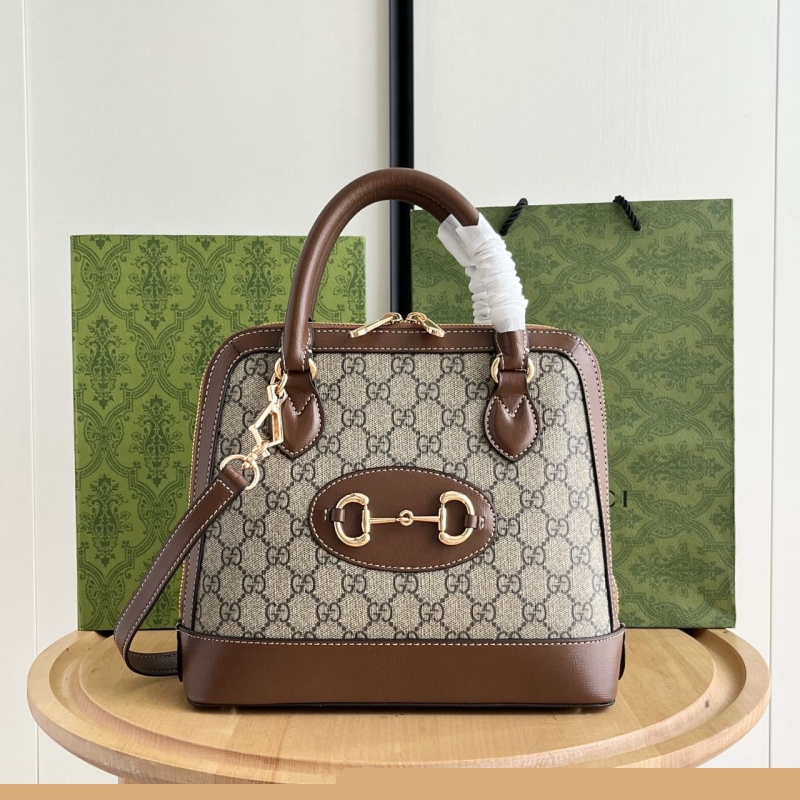 G*u*i top handle bags